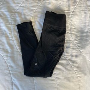 Lululemon speckled yoga pants size 4. Black pants with white speckles.